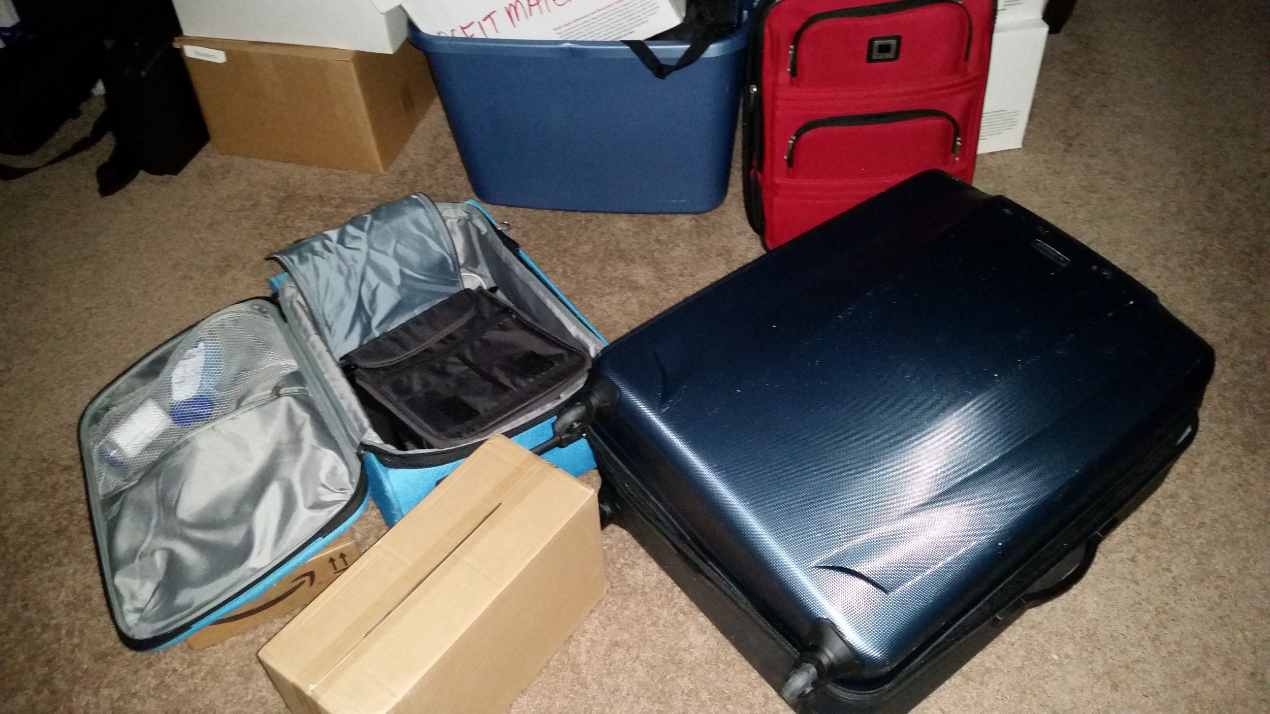 Several Suitcases on Carpet
