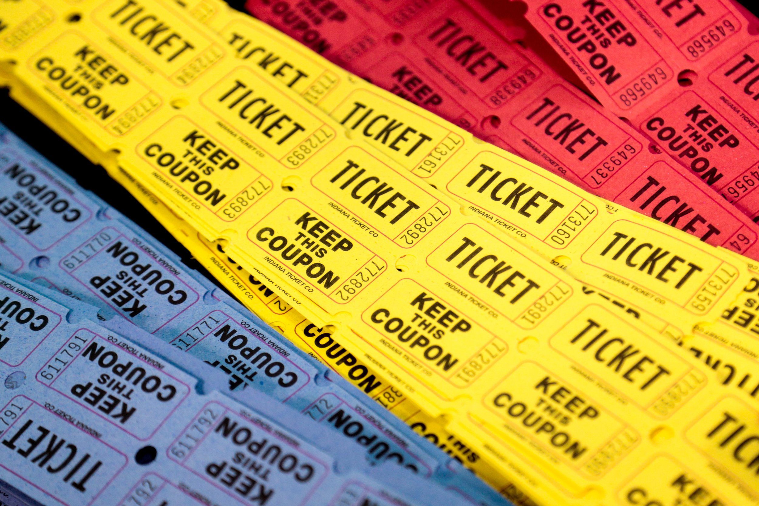Several Tickets in Yellow Blue and Red