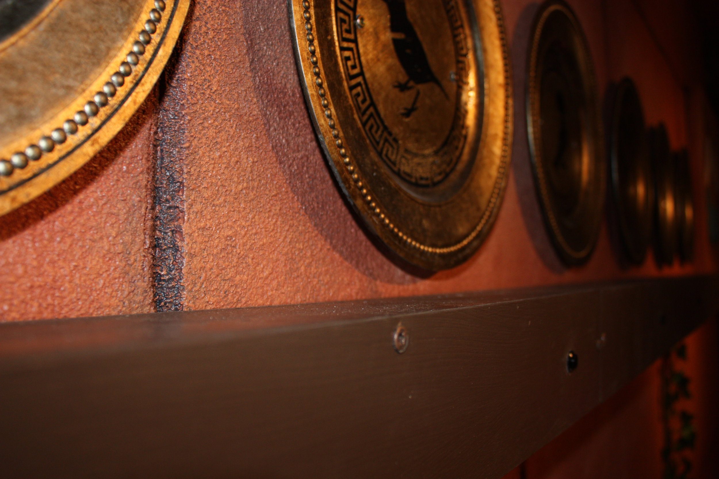 Bronze Plates Hanging on a Wall